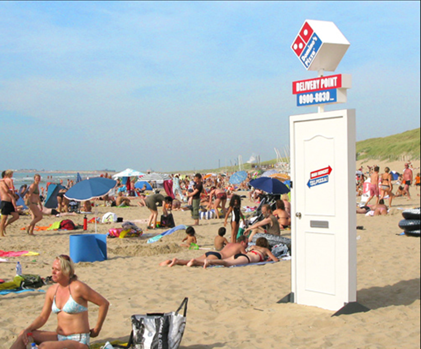 Puerta Dominos Pizza playa